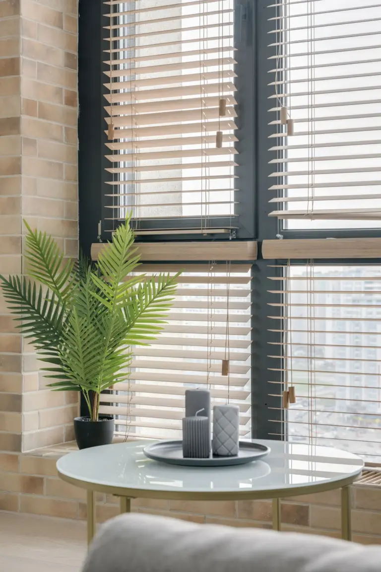 Wooden and white Venetian blinds on a living room window